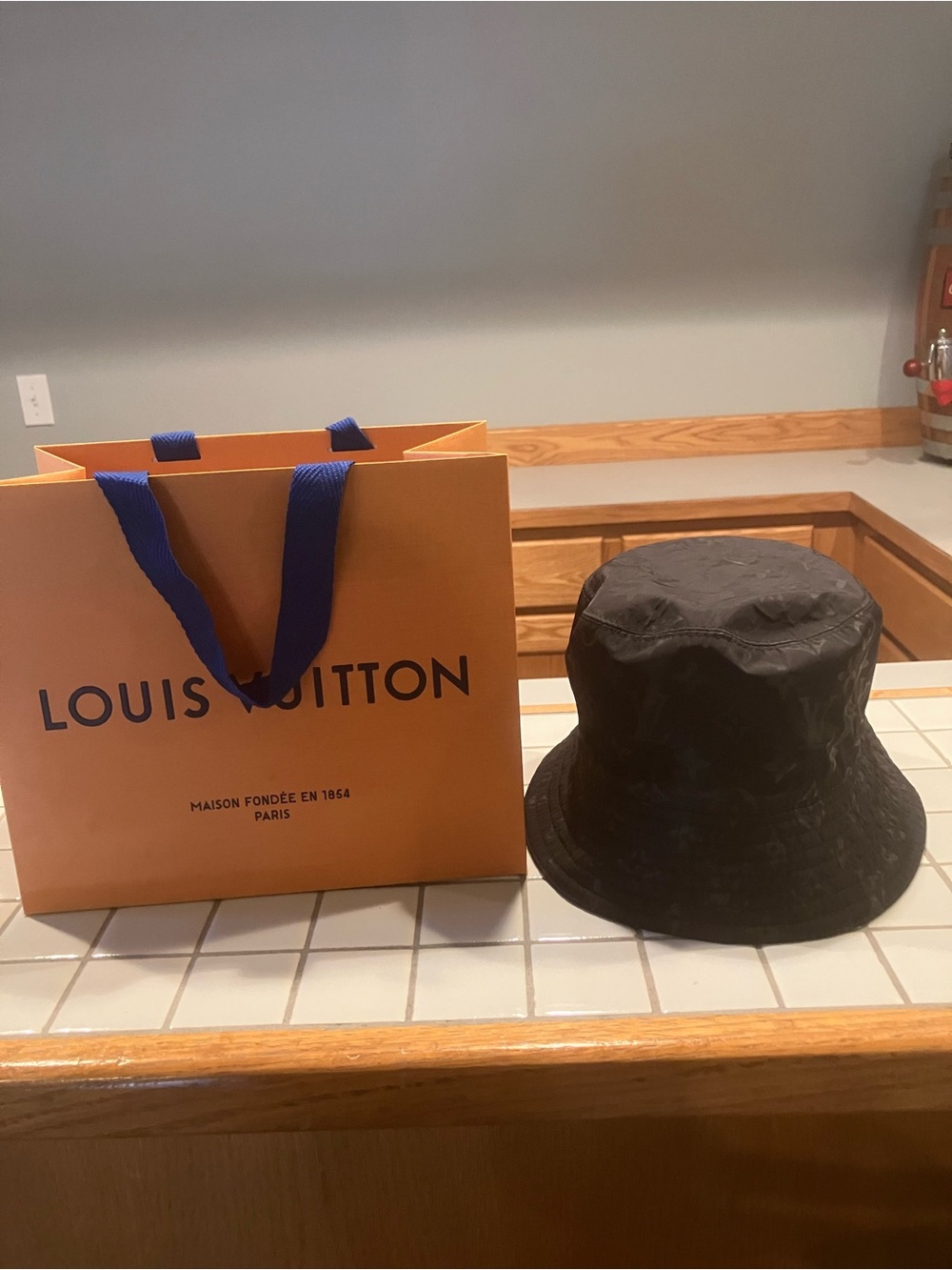 Louis Vuitton Black Monogram rain bucket hat reverses into a denim hat